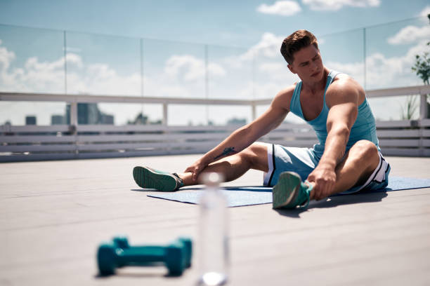 istock Exhausted man is resting after work out outdoors 1142216946