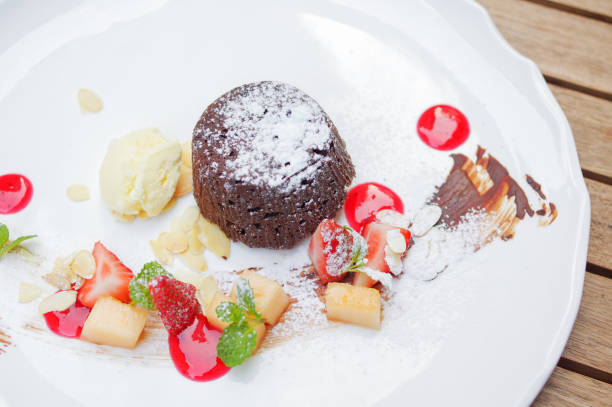 istock Chocolate cake and icecream. Desserts in a white plate. 1142223180