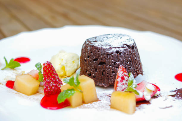 istock Chocolate cake and icecream. Desserts in a white plate. 1142224561