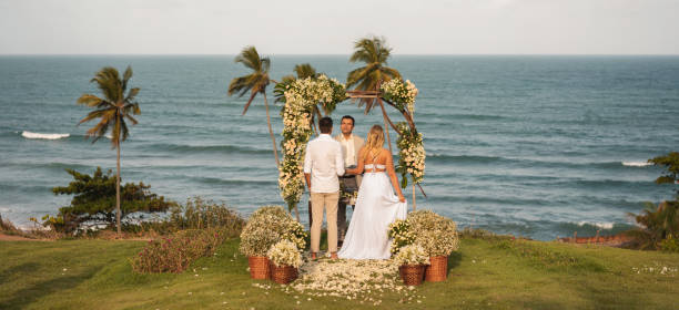 Pastor celebrating elopement wedding on the tropical beach