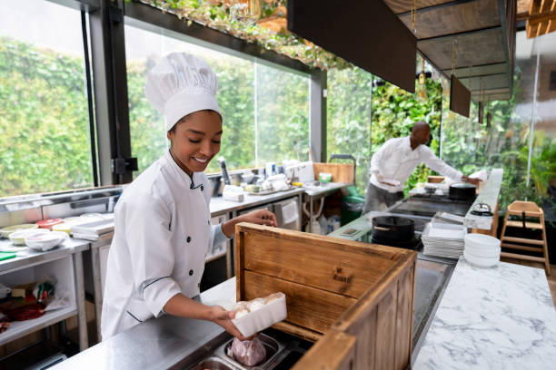 istock African American cook working at a restaurant 1142230191