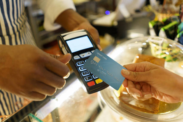 istock Close-up on a contactless payment at a cafe 1142230267