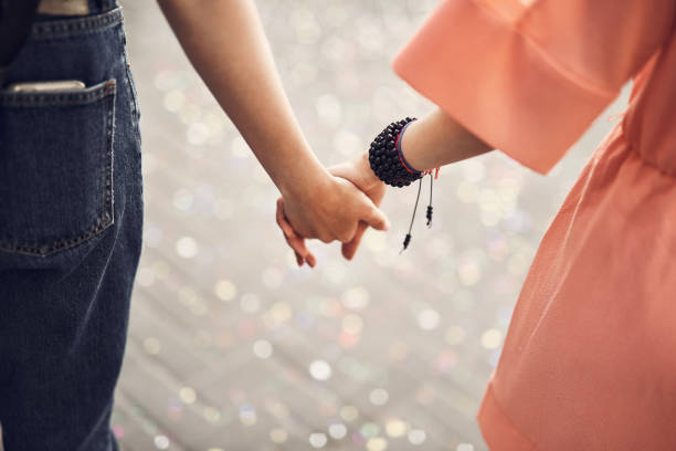 istock Females arms keeping together outside 1142231933