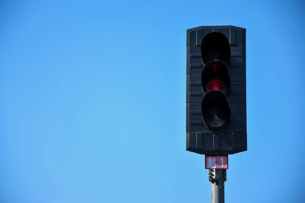 istock Railroad traffic light on which red lights. Construction of railway tracks. Railway infrastructure 1142234447