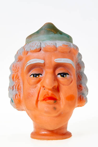 istock Vintage finger punch puppet, grandmother with blue hat 1142236186