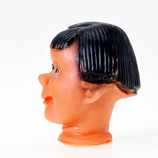 istock Vintage finger punch puppet, young smiling boy 1142236917