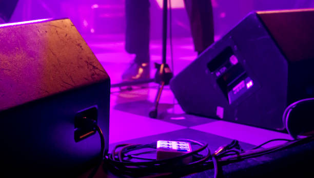 istock Ambient stage light and rock band live performance in a livehouse 1142237177