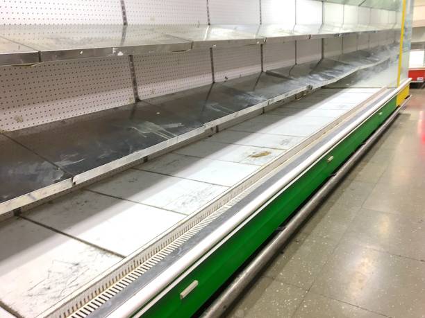 istock Empty Old Dirty Supermarket Shelves 1142238381