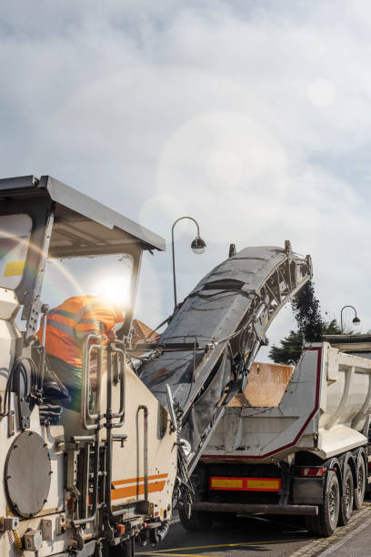 istock works to rebuild the roadway 1142241661