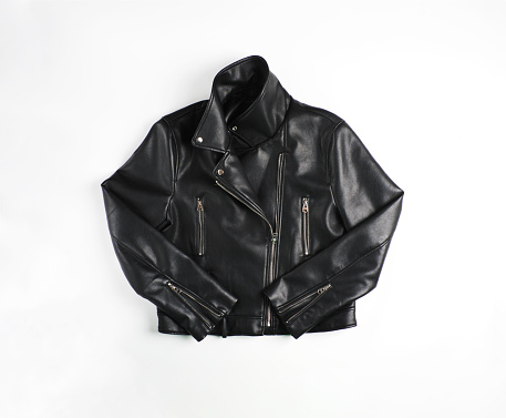 Classic vintage black leather bikers jacket shot from the front isolated on white.