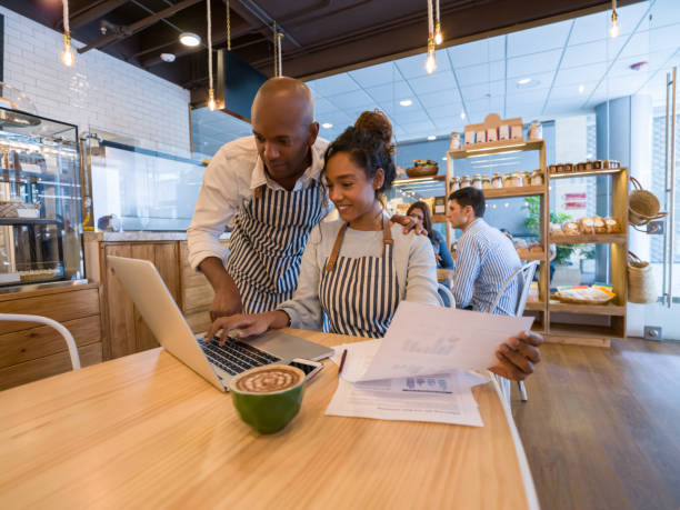 istock Staff doing the books at a restaurant 1142243811