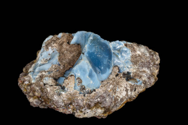 istock Macro stone Opal mineral in rock on a black background 1142244932