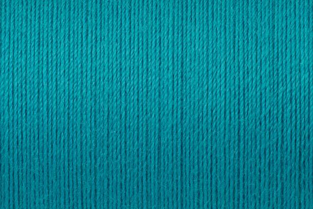 macro picture of turquoise thread texture background - sewing item imagens e fotografias de stock