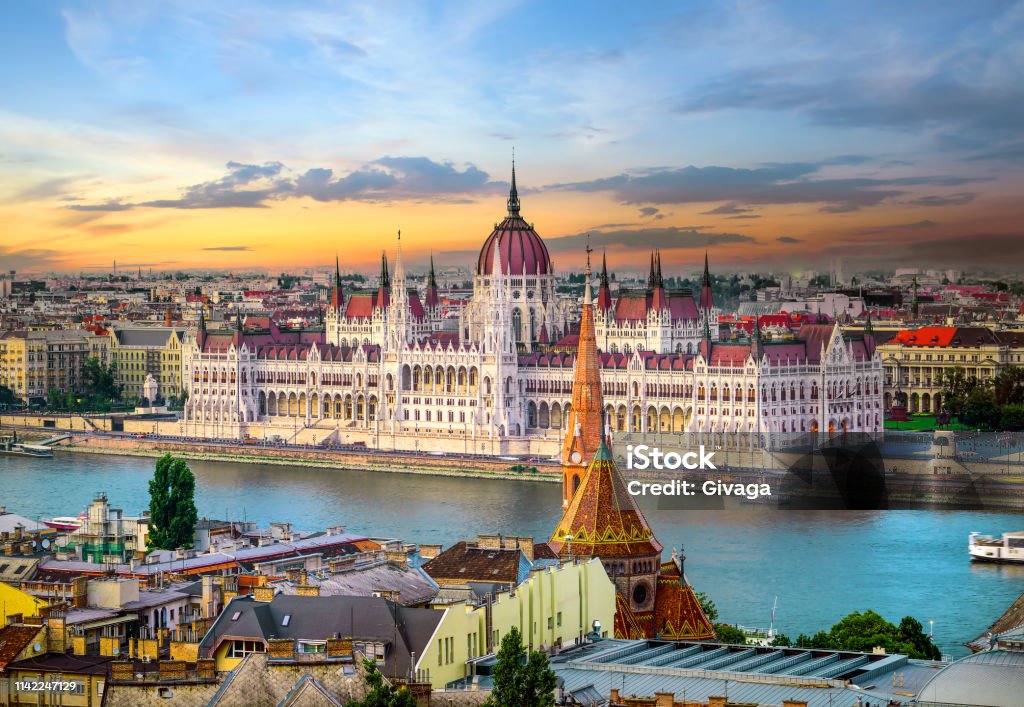Landmarks in Budapest Bright sunset over famous landmarks in Budapest Budapest Stock Photo