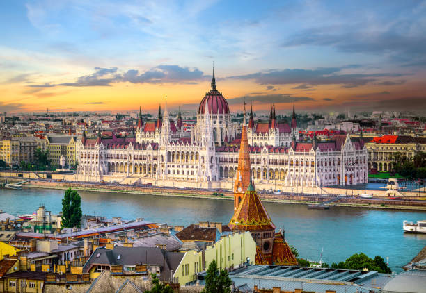Landmarks in Budapest Bright sunset over famous landmarks in Budapest hungary stock pictures, royalty-free photos & images