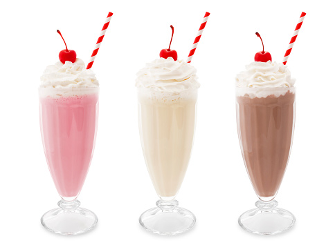 Strawberry, vanilla and chocolate milkshakes isolated on white (excluding the shadow)