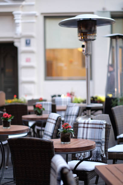istock Empty tables of street cafes 1142262611