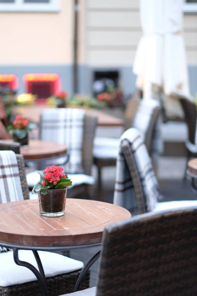 istock Empty tables of street cafes 1142262657