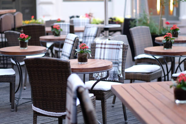 istock Empty tables of street cafes 1142262700