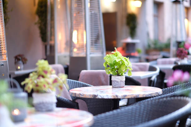 istock Empty tables of street cafes 1142262701