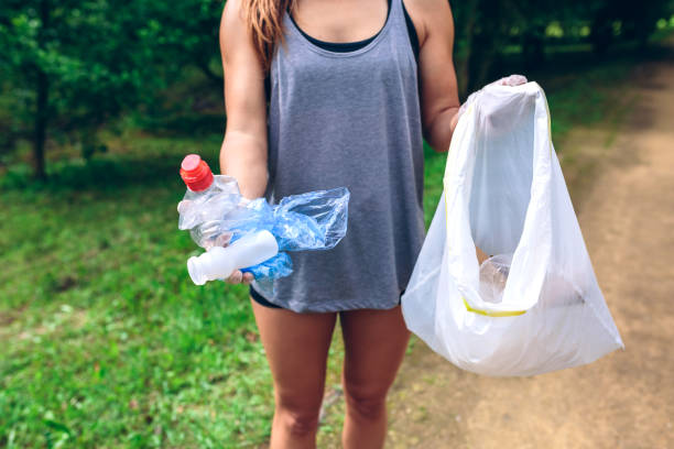 istock Unrecognizable girl showing garbage 1142263107