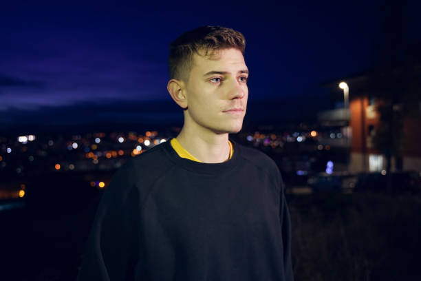 istock Young man  by city views at night 1142264484