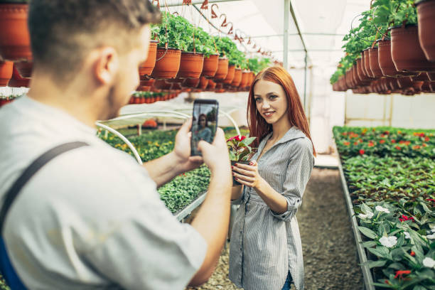 istock Gardners working in the Garden Center 1142265877