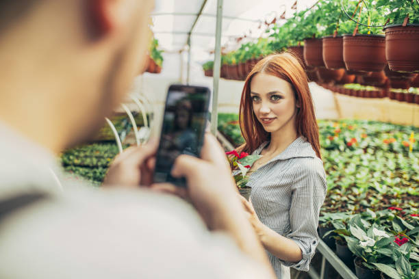 istock Gardners working in the Garden Center 1142265914