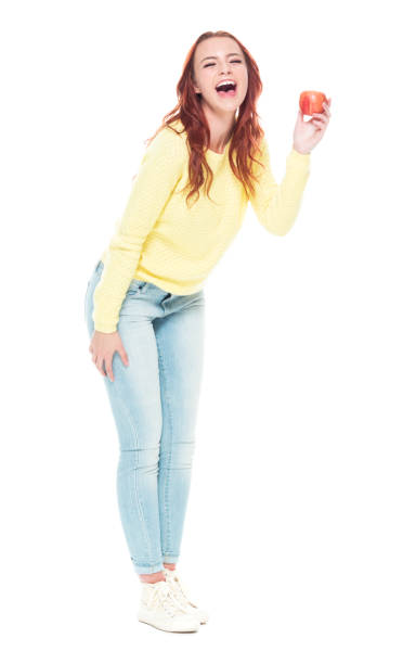 istock Female holding an apple 1142268909
