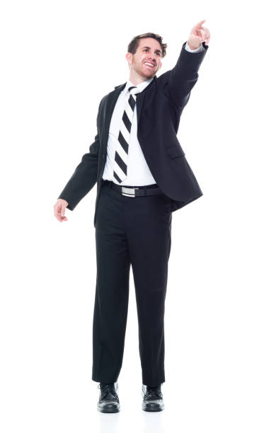 istock Good looking businessman wearing a dark suit - front view, pointing and touching 1142271086