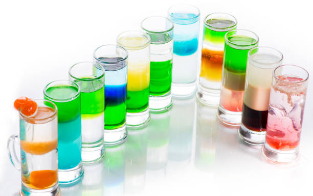 istock shots of colored layers of different alcohol 1142273000