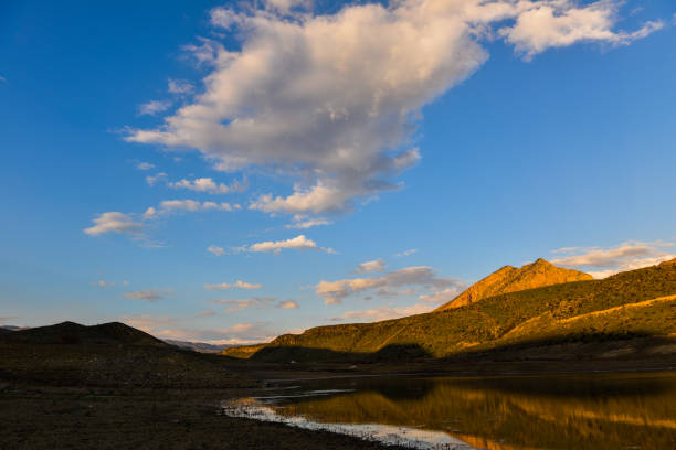 istock Beautiful sunset over lake 1142280287