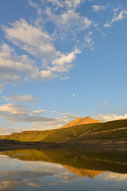 istock Beautiful sunset over lake 1142280308