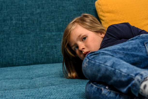 istock The child is on the couch 1142283868