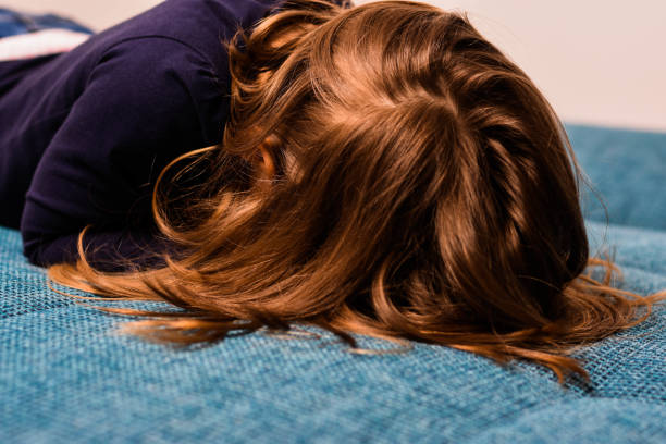 istock The child is on the couch 1142283872