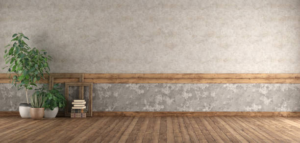 istock Empty room with wooden floor and old wall 1142285412