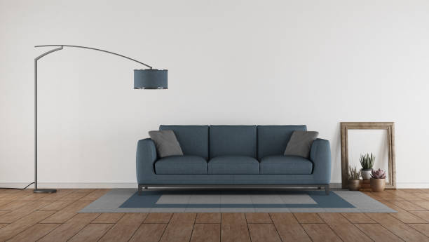 istock Blue sofa in a minimalist living room 1142285468