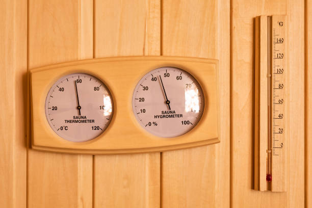 istock Sauna thermometer and hygrometer on wooden wall. Temperature in celsius. 1142288741