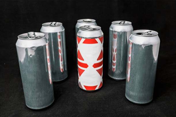 istock To be different. Stand out from the crowd. Empty open aluminium cans, inequality concept. On a black background. 1142288780