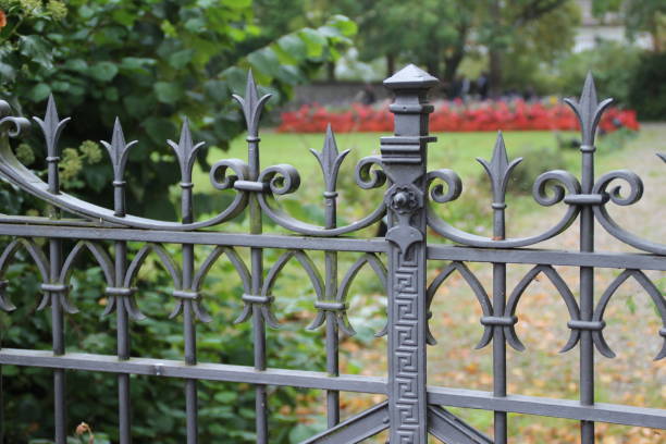 istock Metal curly fence in the park 1142290190