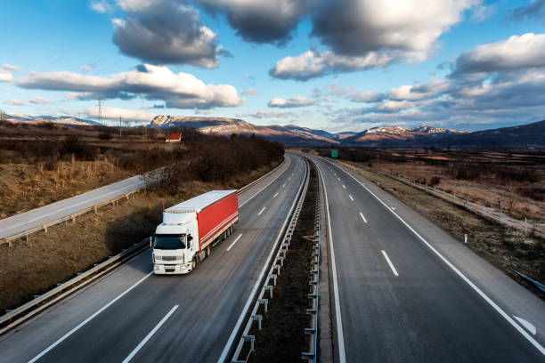 istock Single lorry truck on country highway 1142290718