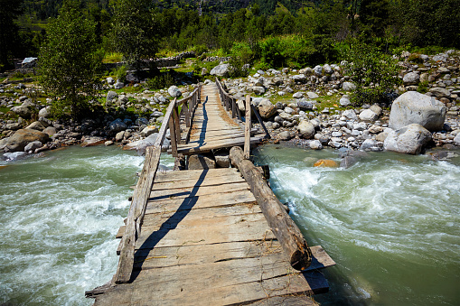 Bridge over Beas River in Himalayas near Manali. Kullu Valley, Himachal Pradesh, India