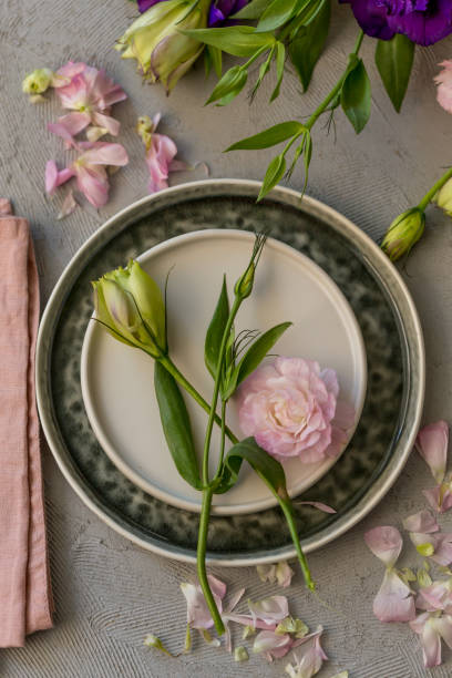 istock Upper view shot of spring table arrrangement with pink ranunculus 1142300563