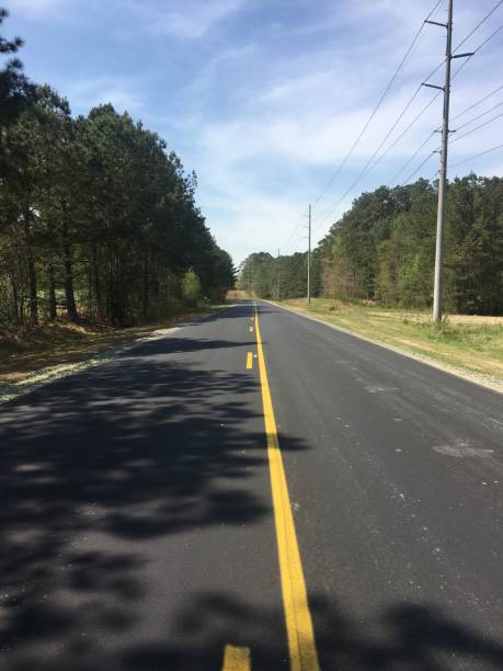 istock Country Road on a Sunny Day 1142304011