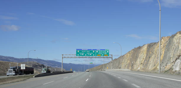 Trans-Canada Highway West of Kamloops, British Columbia Kamloops, Canada - April 7, 2019: Traffic flows on the Trans-Canada Highway near the Coquilhalla Highway in the Thompson-Nicola Regional District. kamloops stock pictures, royalty-free photos & images
