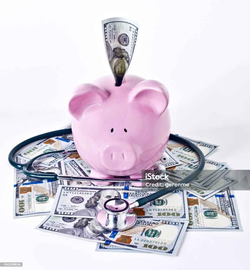 Piggy bank and saving concept Saving money with Piggybank with 100 dollar bills American One Hundred Dollar Bill Stock Photo