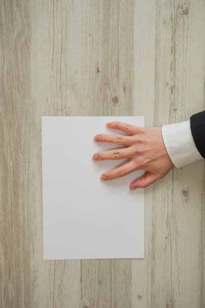 istock Person who puts out documents while angry. Business person receiving documents while angry. 1142326394