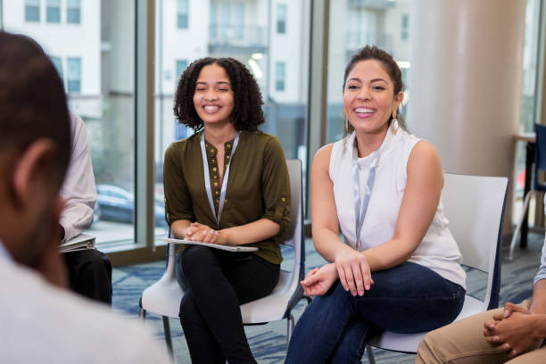 istock Cheerful businesswomen enjoy discussion 1142334481