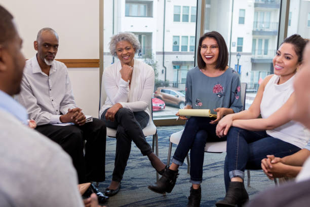 istock Business people laugh during a discussion 1142334485