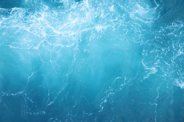 istock Sea Waves in ocean wave Splashing Ripple Water. Blue water background. 1142335873